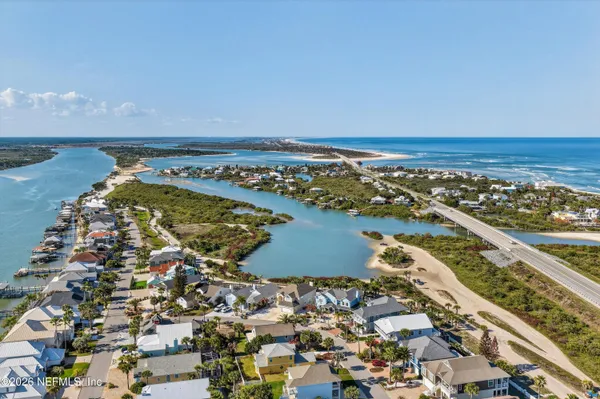 an aerial view of a house with outdoor space