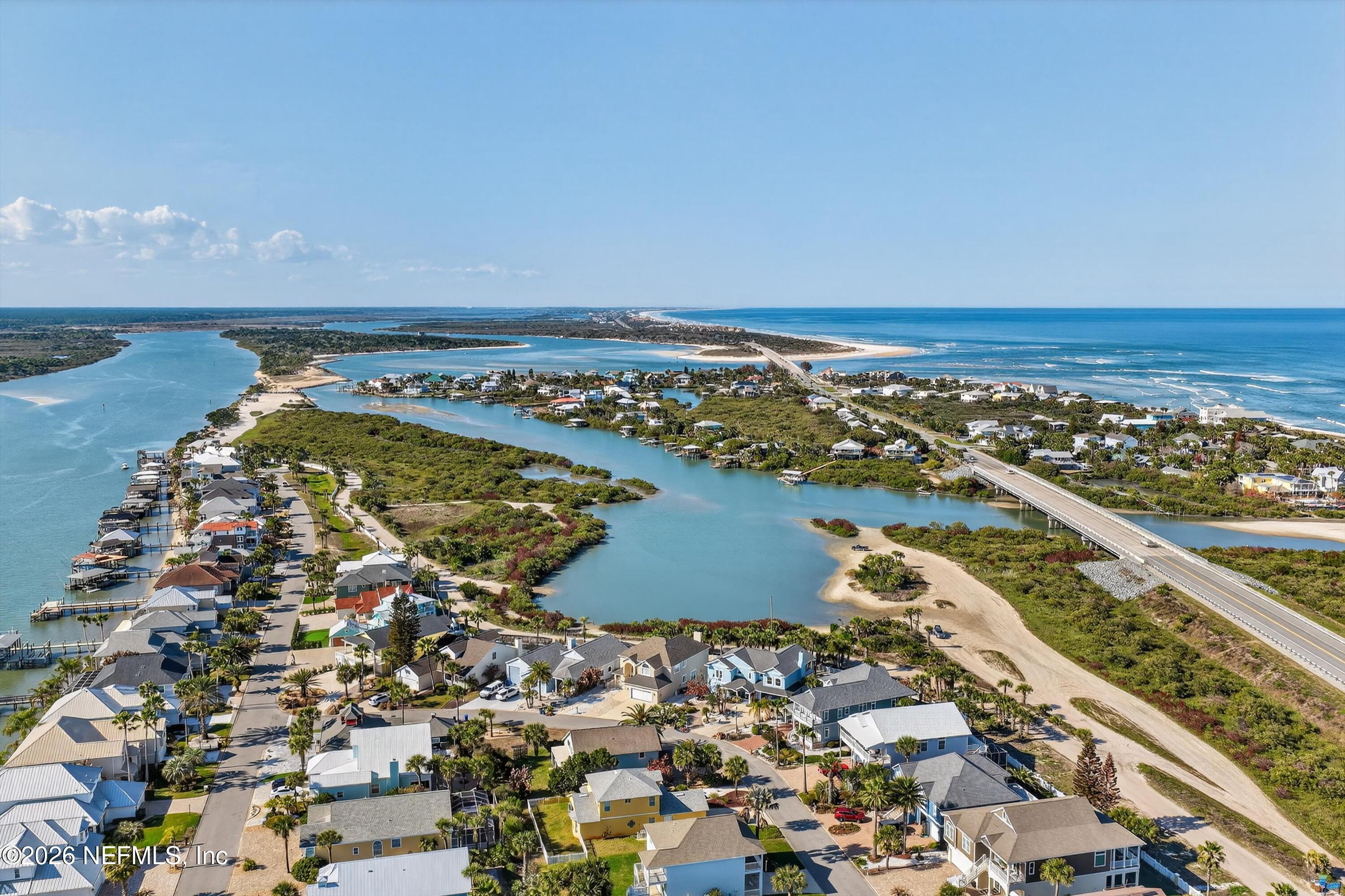 9179 June Lane St. Augustine, FL 32080 - Photo 49 of 56 an aerial view of ocean and residential houses with outdoor space