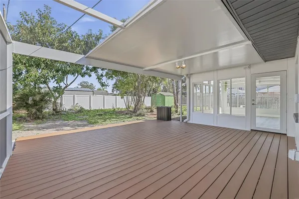 a view of a livingroom with wooden floor