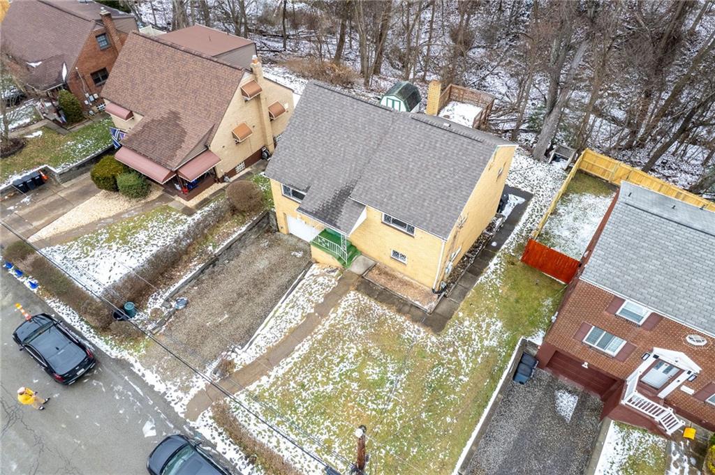 1041 Ardmore Manor Drive Pittsburgh, PA 15221 - Photo 37 of 38 an aerial view of a house with a yard