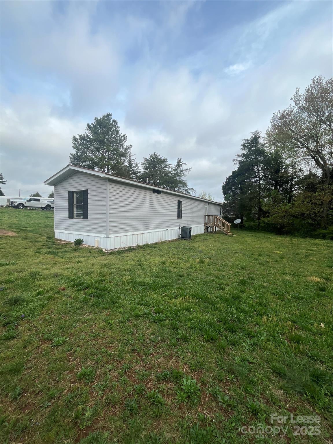 124 Saylor Lane Stony Point, NC 28678 - Photo 11 of 11 a front view of house with garden