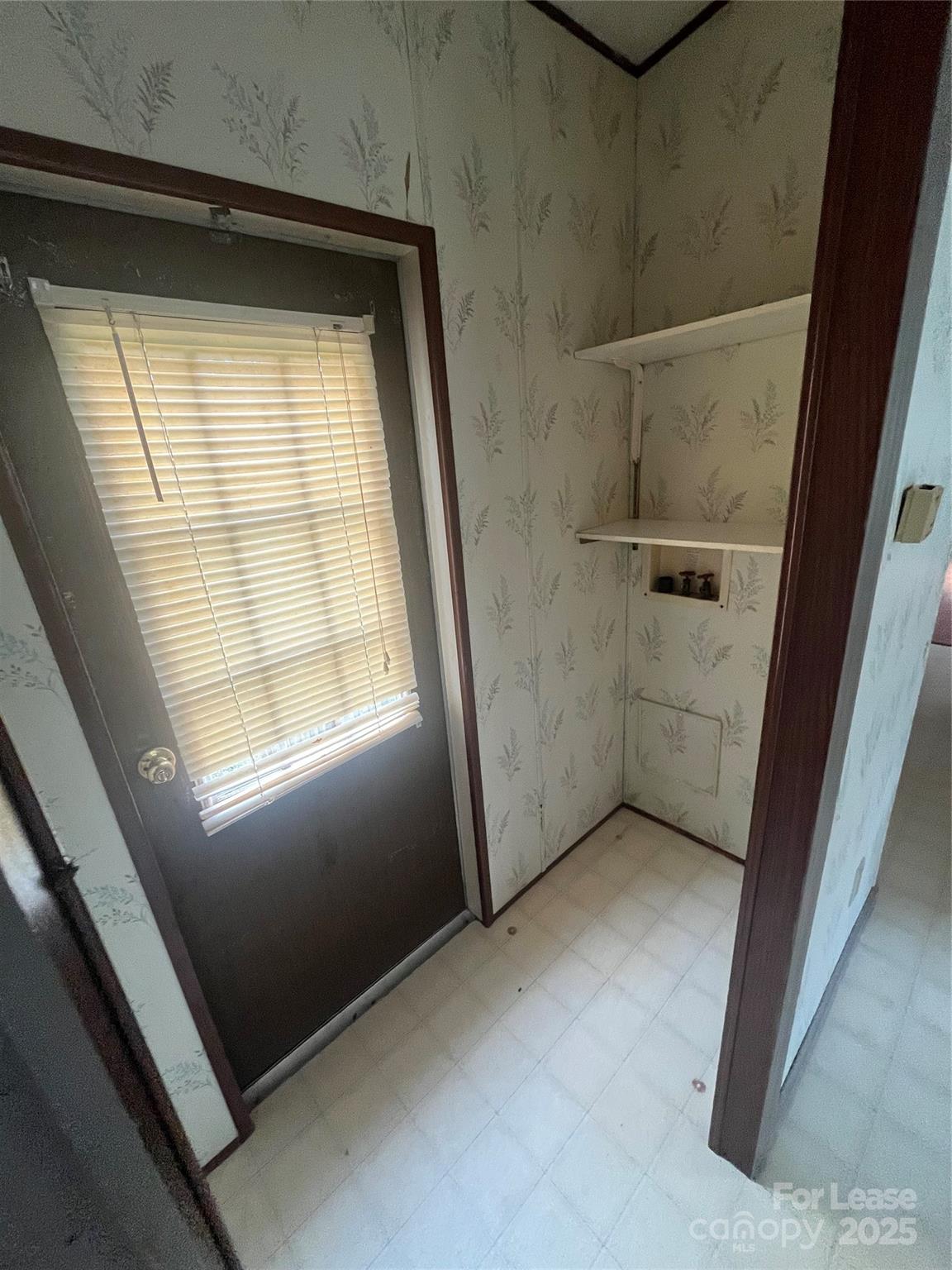 124 Saylor Lane Stony Point, NC 28678 - Photo 4 of 11 a view of an empty room with a window
