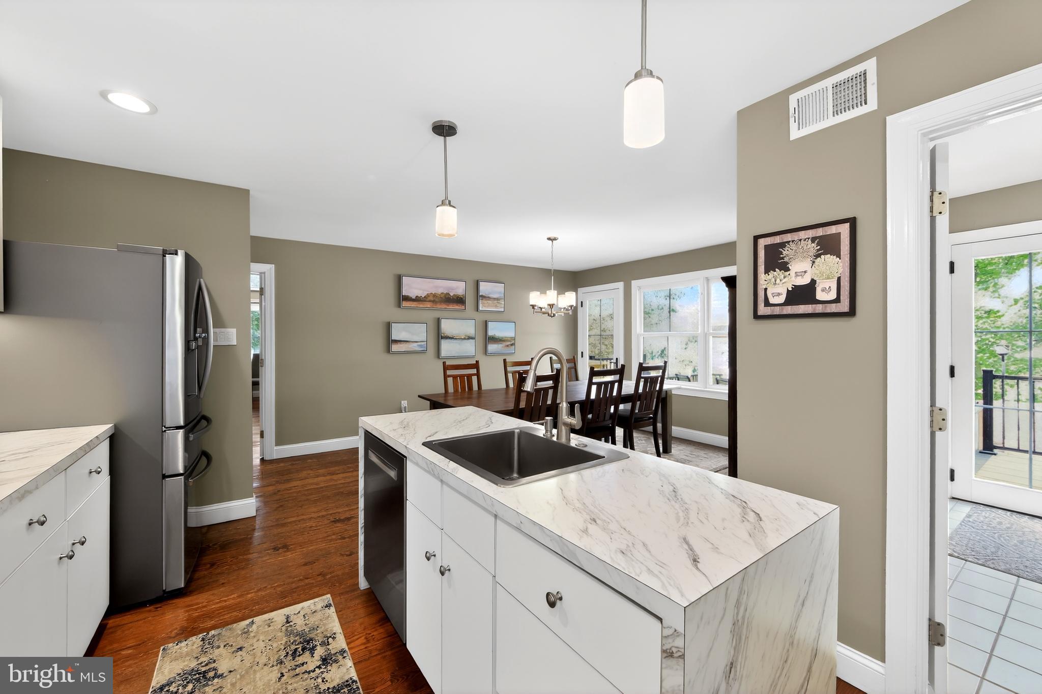 25 Oaktree Hollow Road, Unit R West Chester, PA 19382 - Photo 22 of 50 Kitchen with View to Utility Rm & Door to Deck