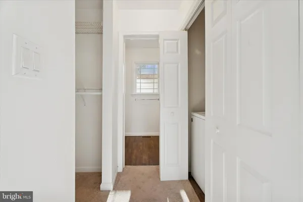 a view of a bathroom from the hallway