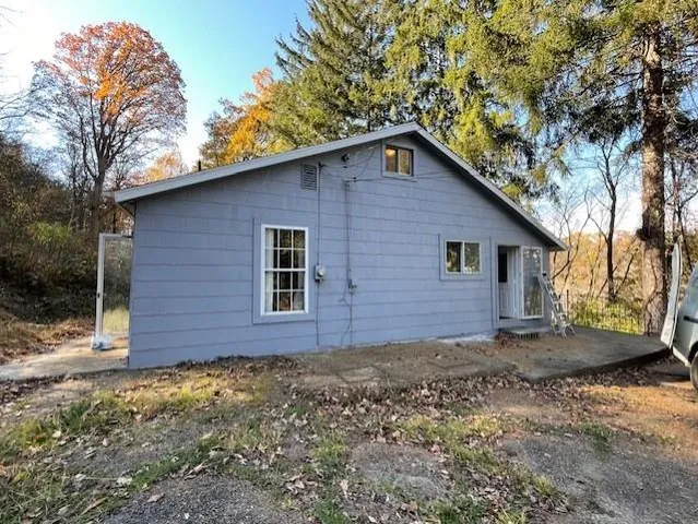 a brick house with a large windows