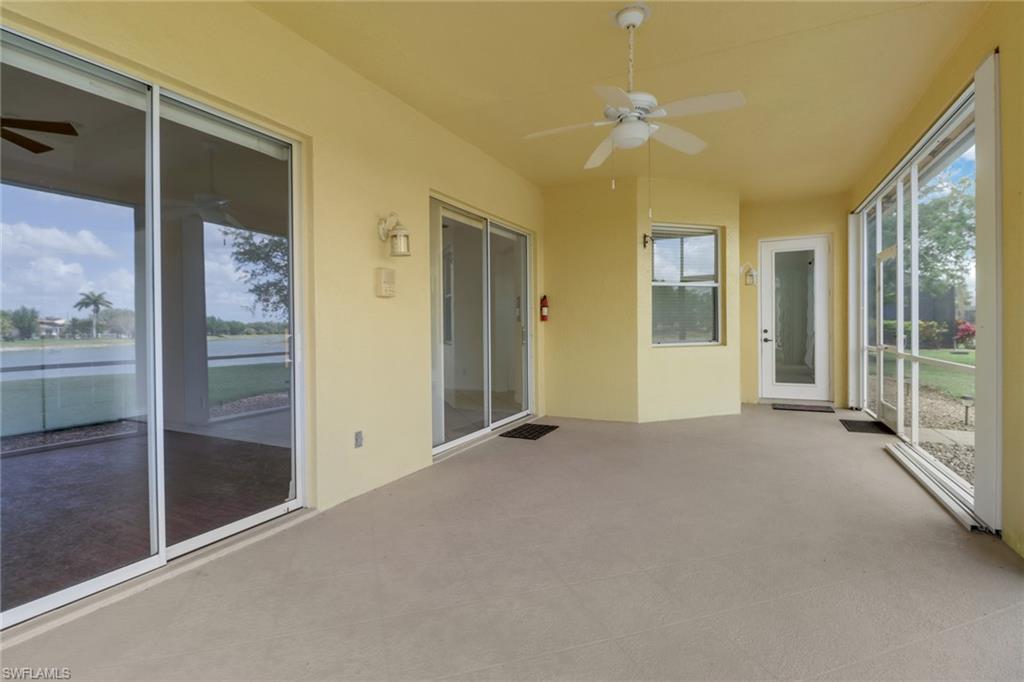 3283 Potomac Court Naples, FL 34120 - Photo 23 of 29 Unfurnished sunroom featuring ceiling fan