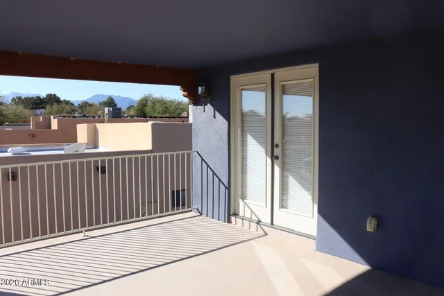 a balcony view with city view