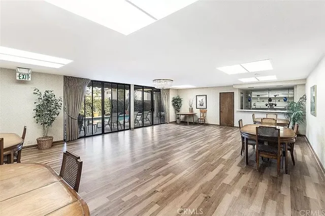 a view of a livingroom with furniture and wooden floor