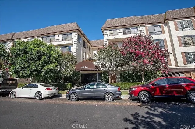 a car parked in front of a house