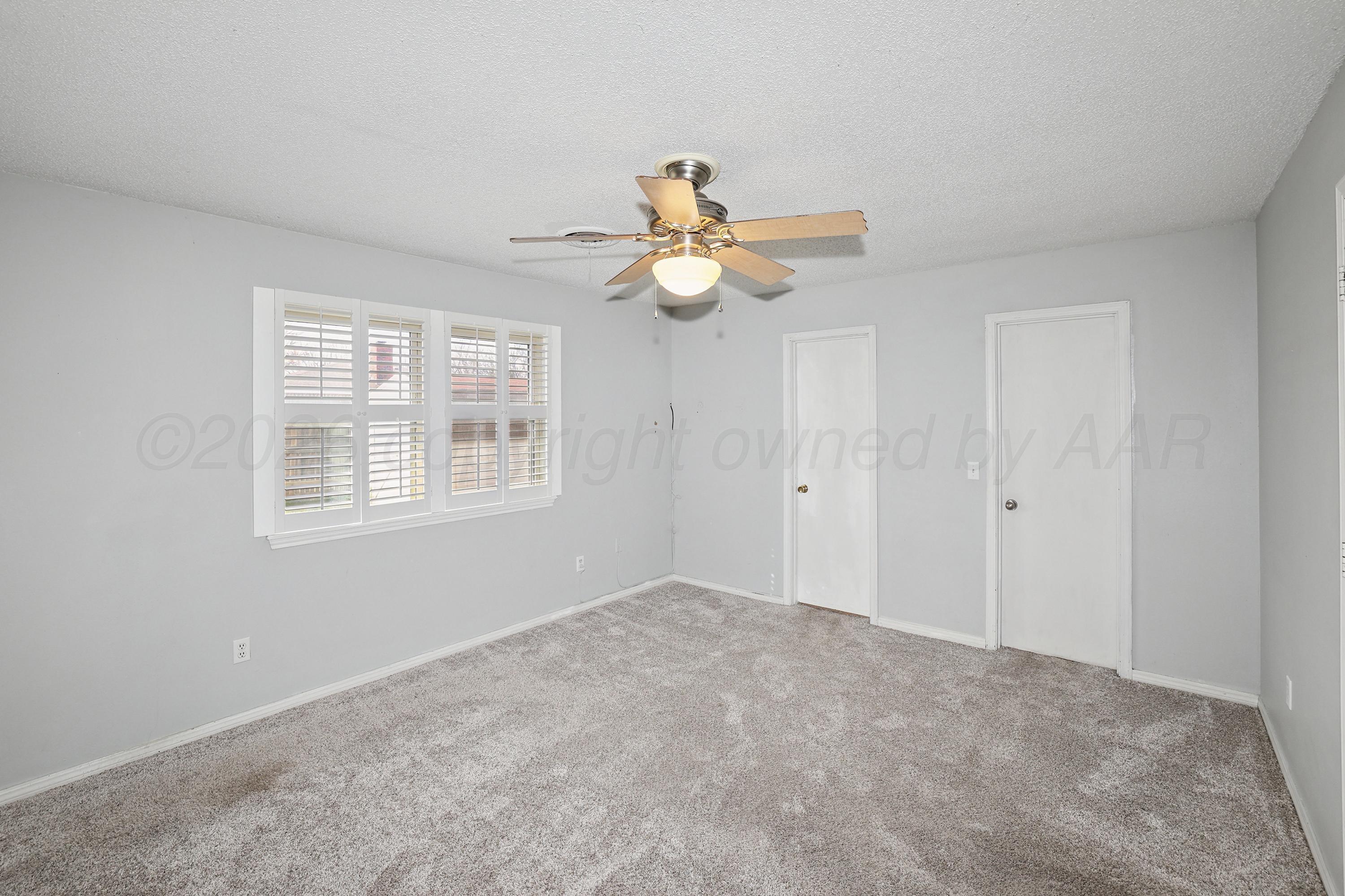 6108 Cornell Street Amarillo, TX 79109 - Photo 14 of 26 a view of an empty room with a window