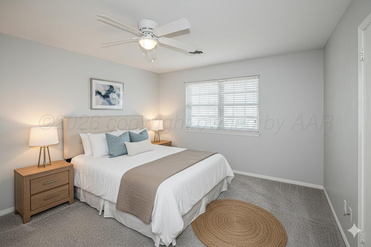 6108 Cornell Street Amarillo, TX 79109 - Photo 17 of 26 a spacious bedroom with a bed and a window