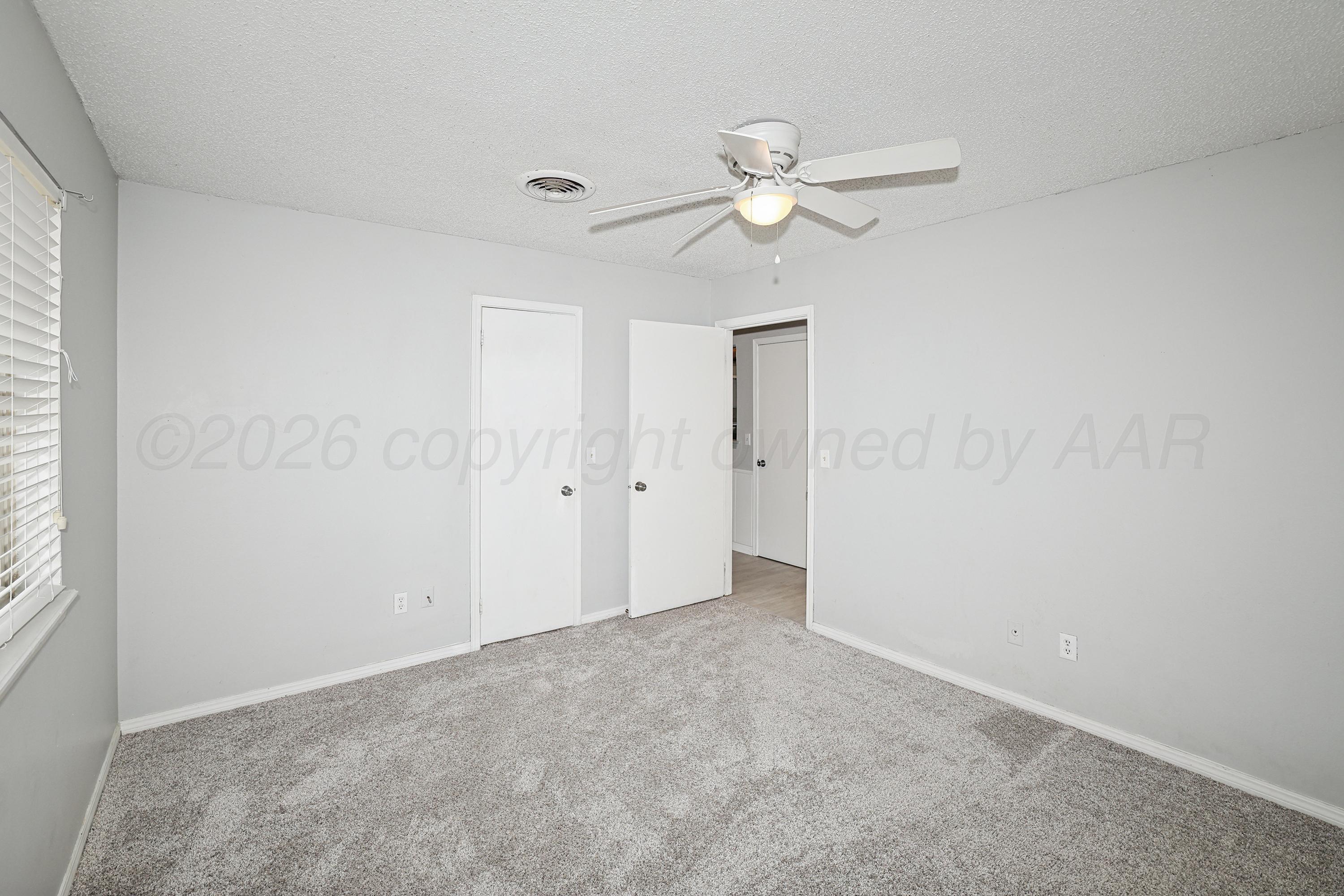 6108 Cornell Street Amarillo, TX 79109 - Photo 18 of 26 a view of an empty room with a window