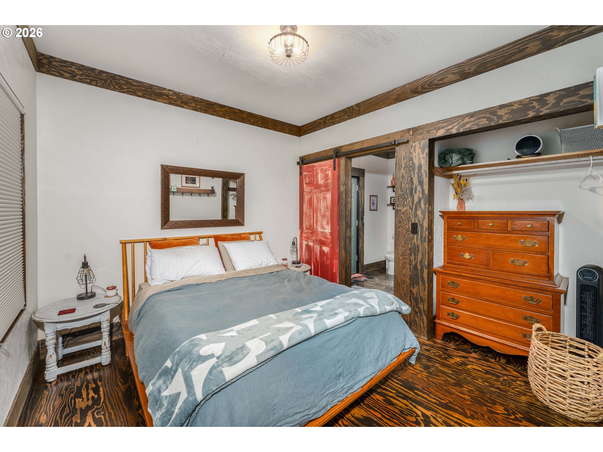 48367 Roaring Rapids Way Oakridge, OR 97463 - Photo 12 of 23 a bedroom with a bed and a dresser