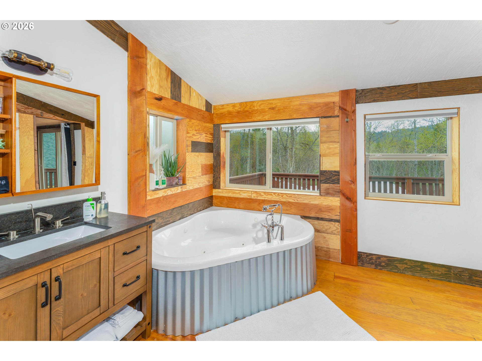 48367 Roaring Rapids Way Oakridge, OR 97463 - Photo 18 of 23 a bathroom with a sink and a bathtub