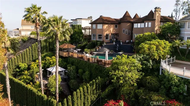 a view of swimming pool from a balcony