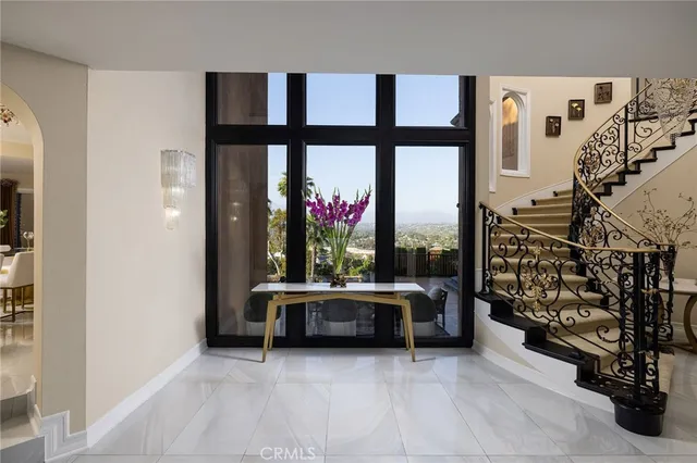 a view of front door with outdoor seating