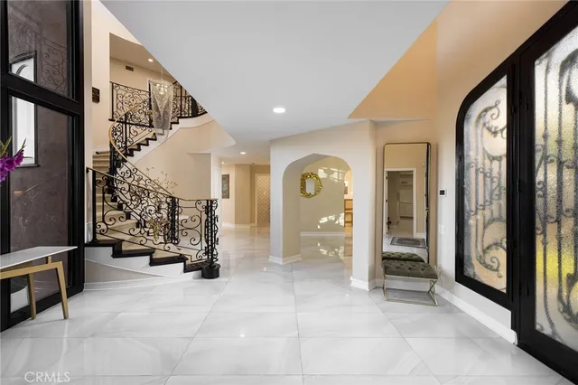 a view of a hallway with livingroom view and living room