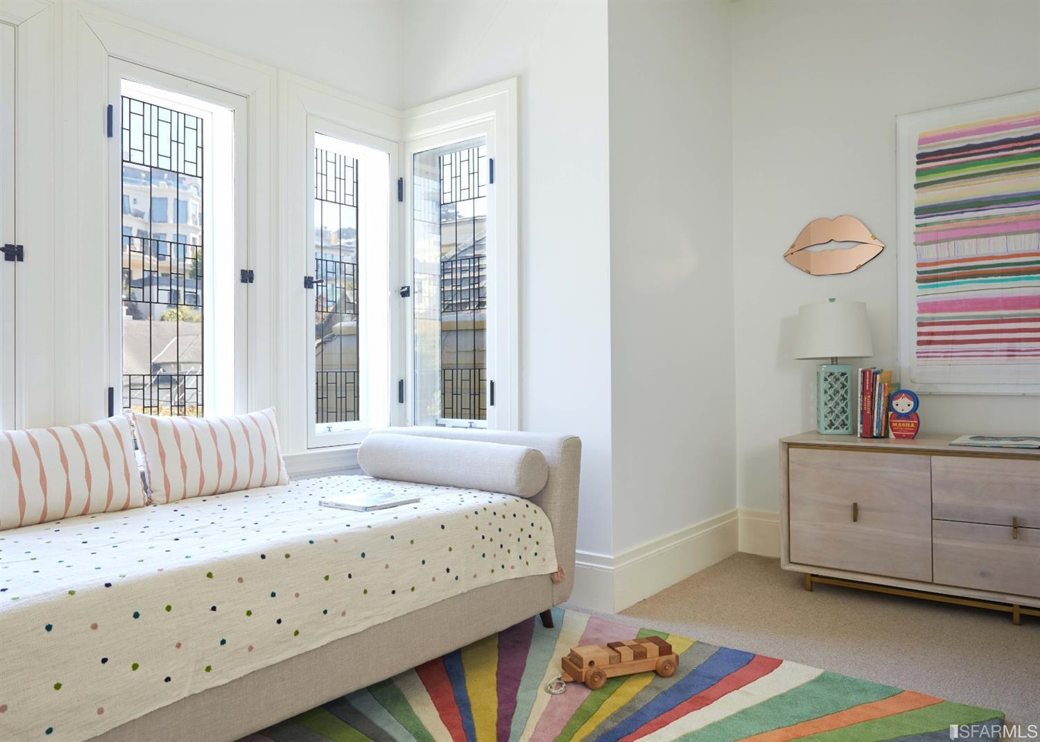 2440 Broadway San Francisco, CA 94115 - Photo 22 of 39 a bedroom with bed and a window