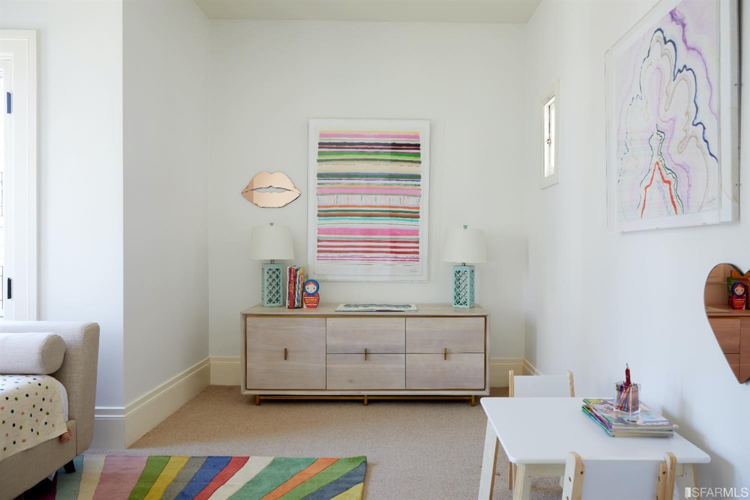 2440 Broadway San Francisco, CA 94115 - Photo 23 of 39 a bedroom with a bed and a table