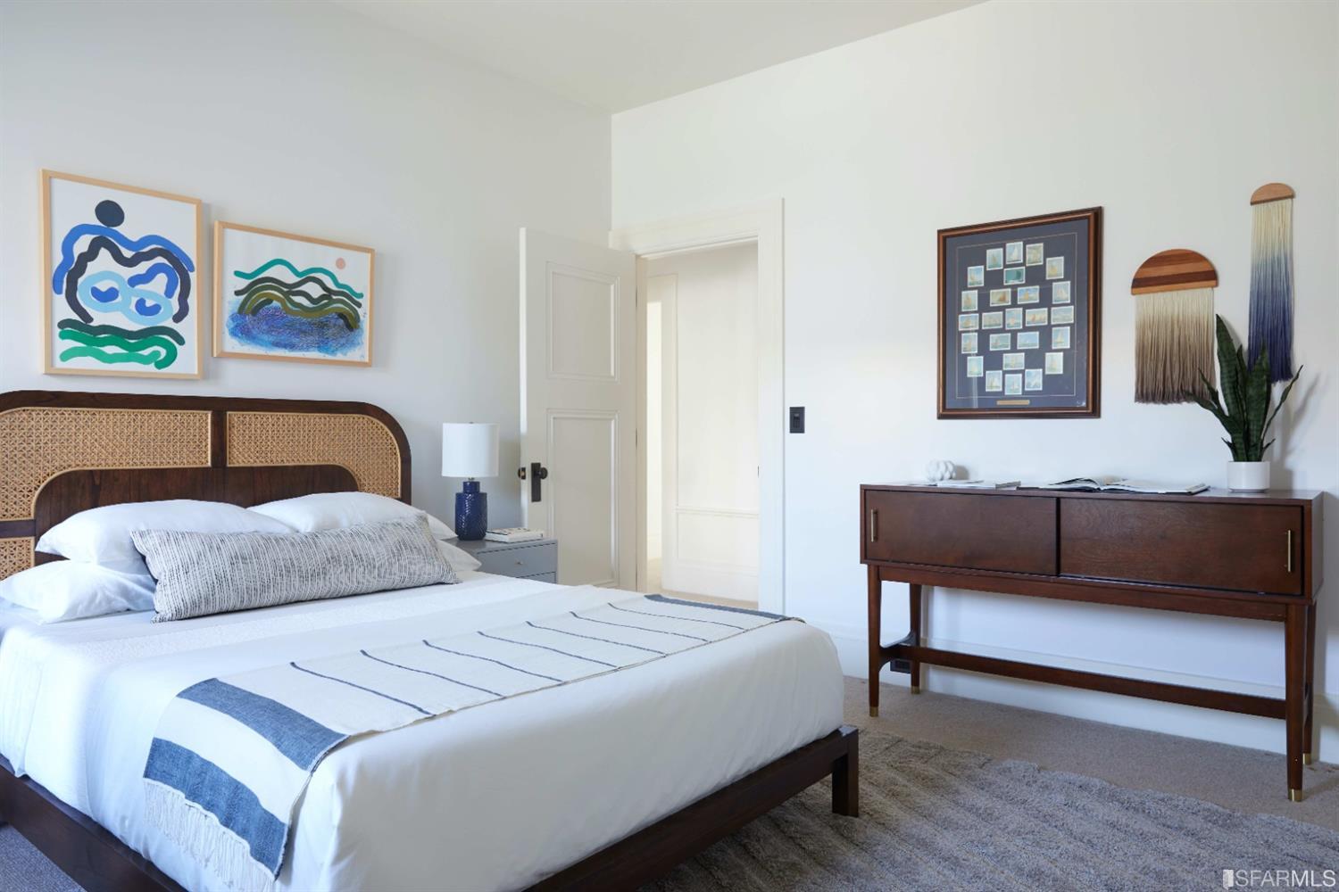 2440 Broadway San Francisco, CA 94115 - Photo 25 of 39 a bedroom with a bed and a couch