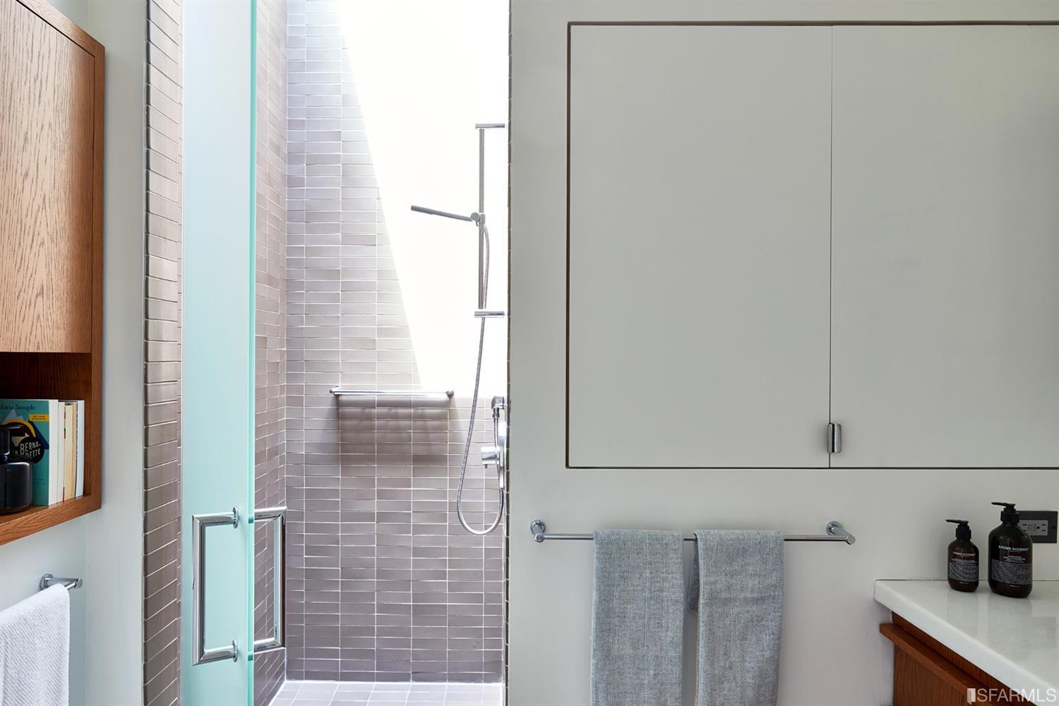 2440 Broadway San Francisco, CA 94115 - Photo 26 of 39 a bathroom with a shower and a sink