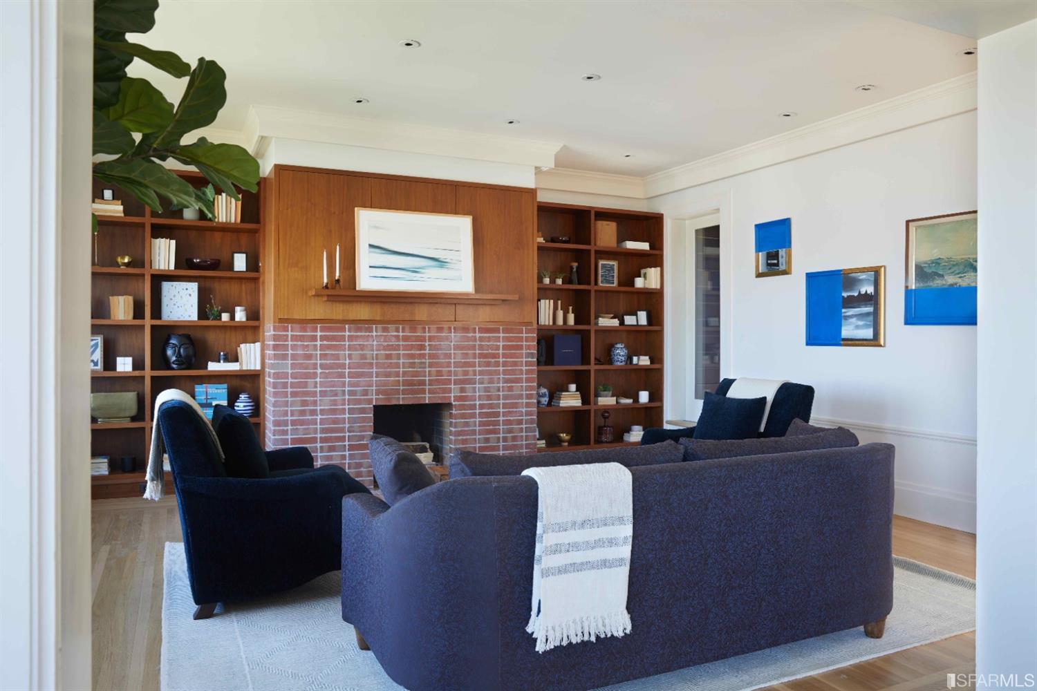 2440 Broadway San Francisco, CA 94115 - Photo 5 of 39 a living room with furniture and a fireplace