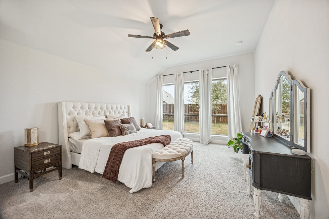 4527 Peloton Road Rosharon, TX 77583 - Photo 18 of 30 a bed room with a bed and a couch