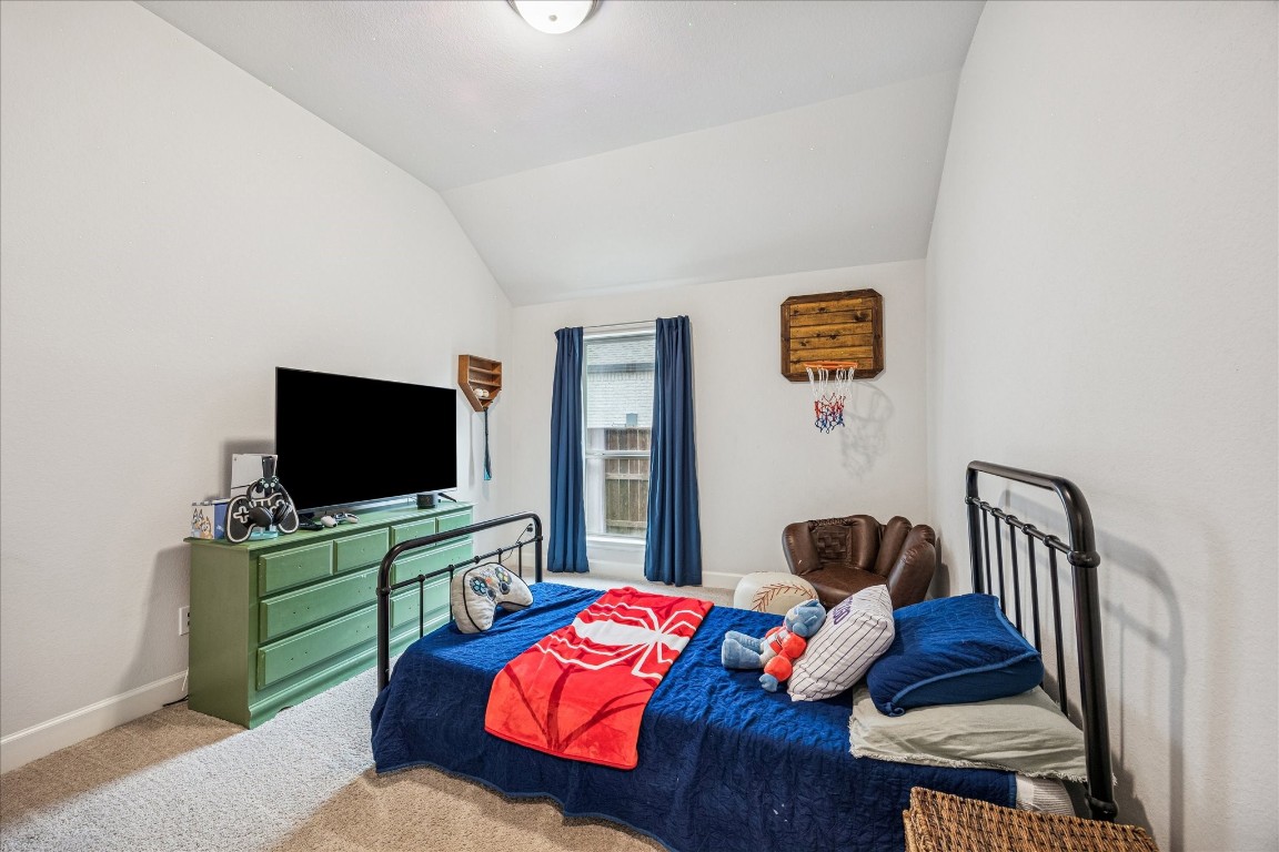 4527 Peloton Road Rosharon, TX 77583 - Photo 24 of 30 a living room with furniture and a flat screen tv