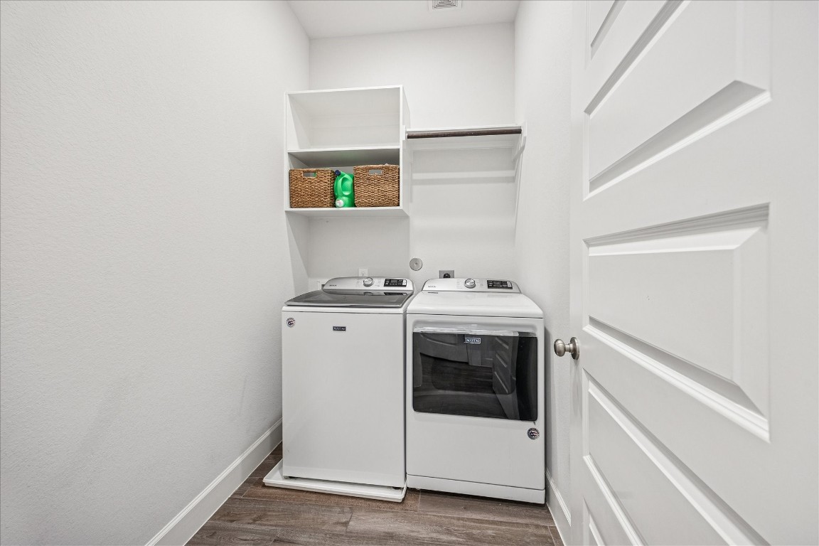 4527 Peloton Road Rosharon, TX 77583 - Photo 29 of 30 a utility room with dryer and washer