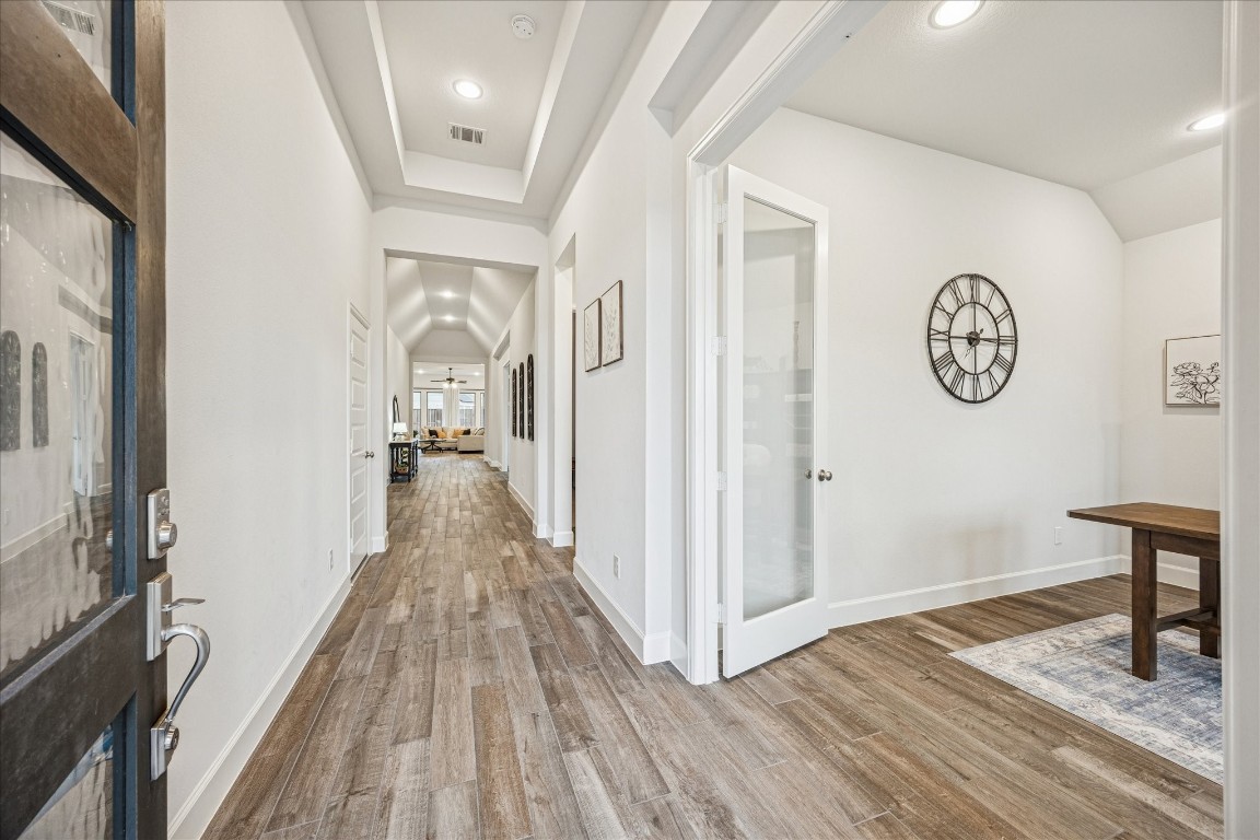 4527 Peloton Road Rosharon, TX 77583 - Photo 8 of 30 a view of a hallway with wooden floor