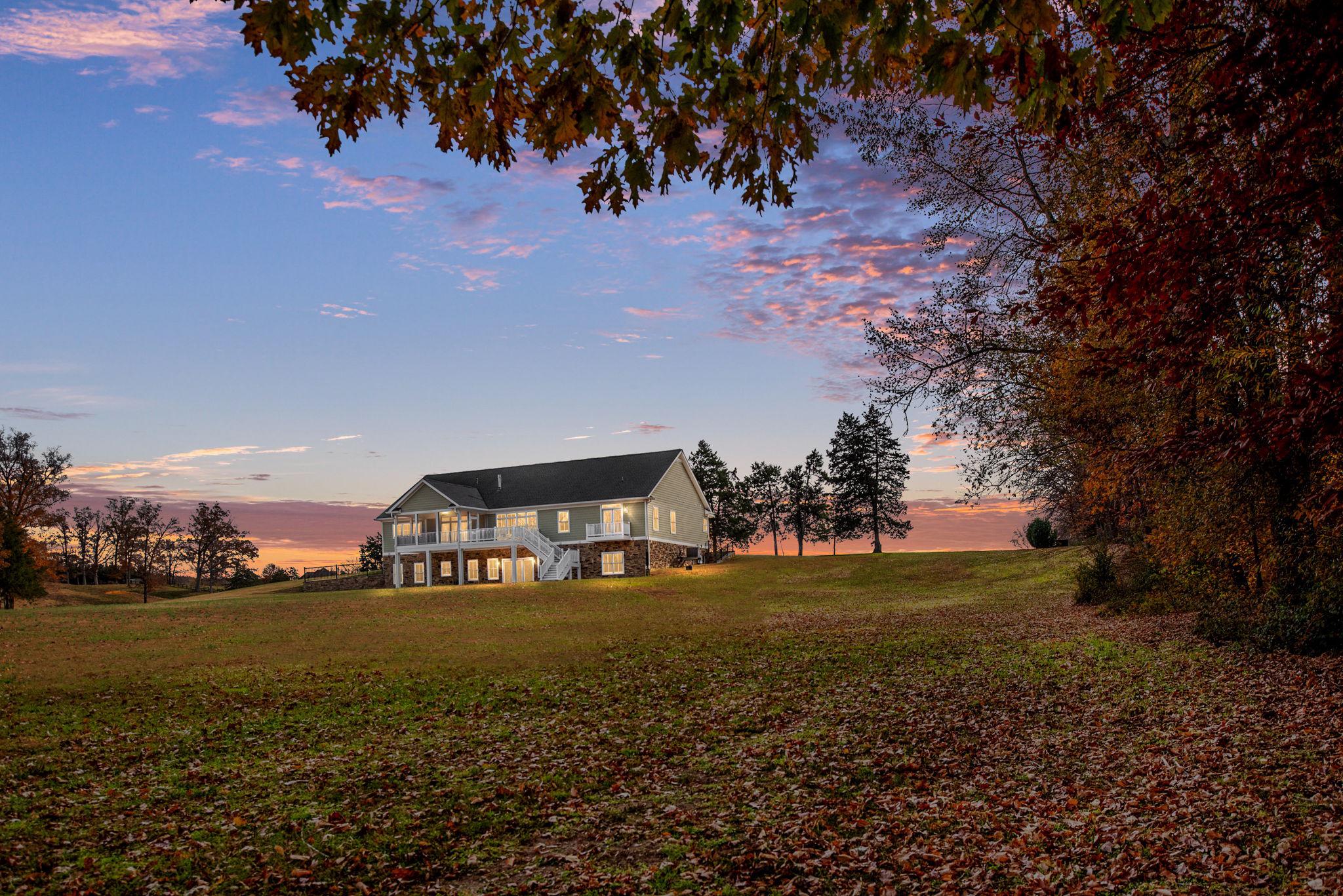 145 Forest Lane Road Fredericksburg, VA 22405 - Photo 8 of 109 Serene sunset over a spacious home.