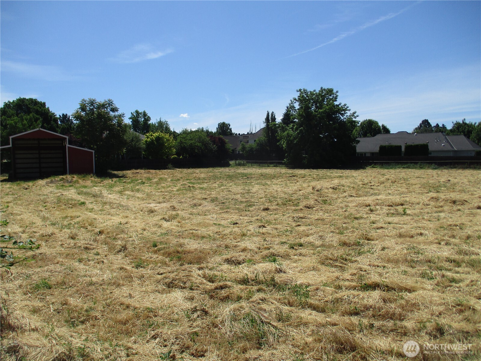 2499 Cottonwood Road Walla Walla, WA 99362 - Photo 2 of 19 a backyard of a house with lots of green space