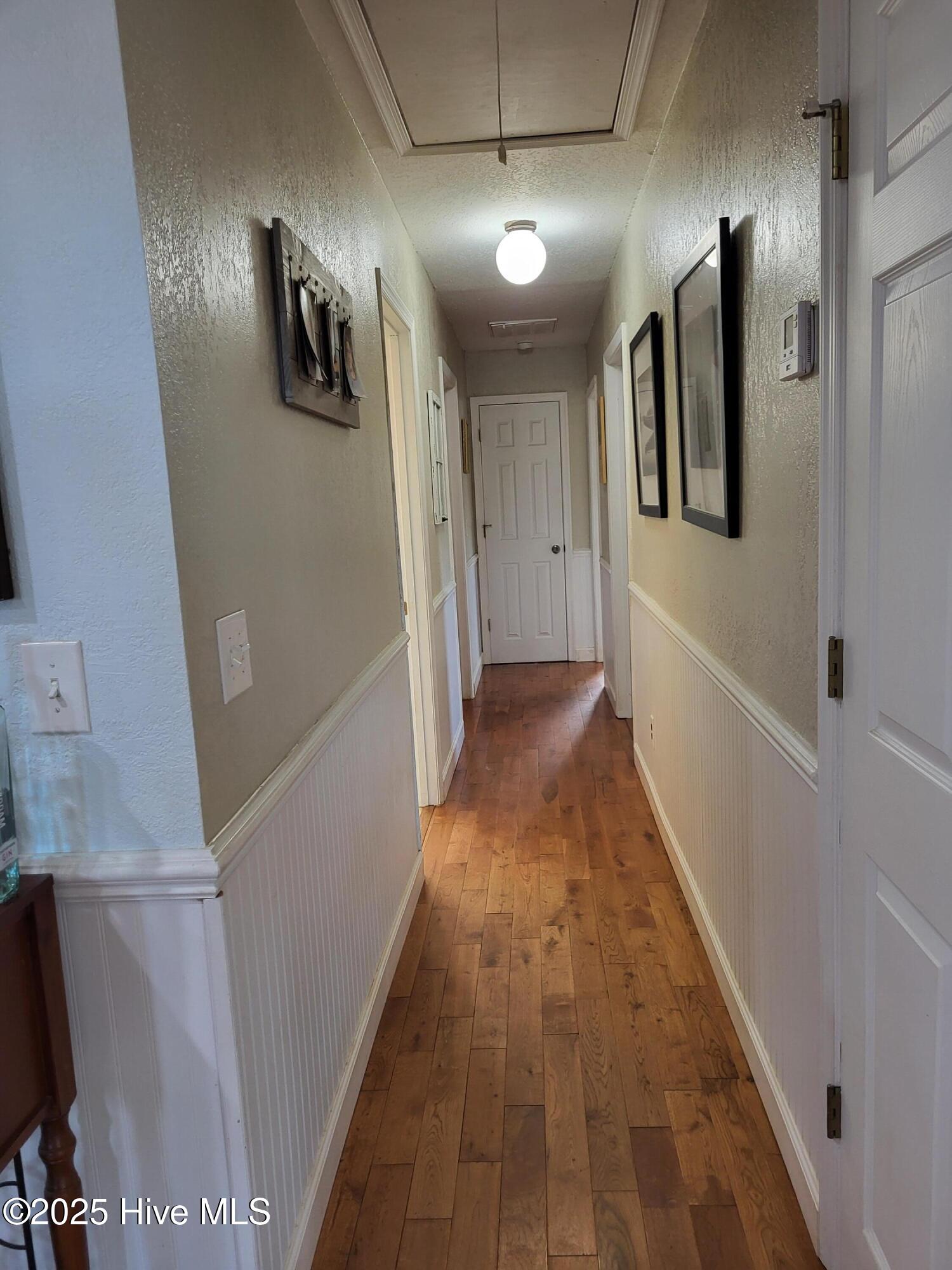 278 Woodstock Road Belhaven, NC 27810 - Photo 26 of 36 Three bedrooms, 2 baths off this hall. Beautiful floors!