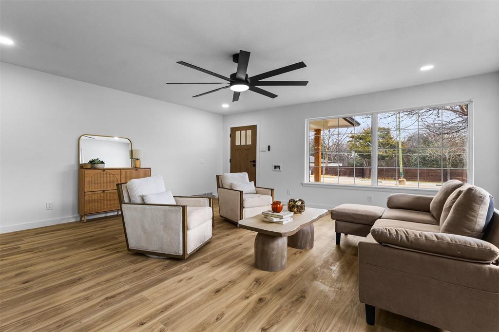 1917 South Vernon Avenue Dallas, TX 75224 - Photo 5 of 28 Spacious living area featuring wood-finish flooring, recessed lighting, and a modern ceiling fan