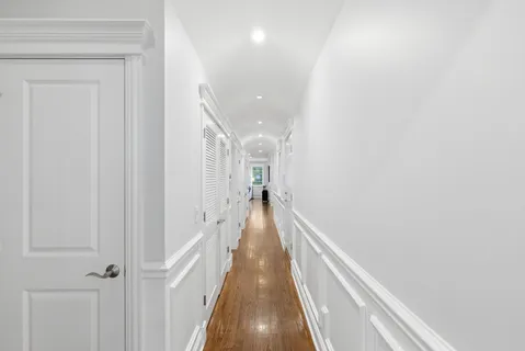 a bedroom with a bed and a closet
