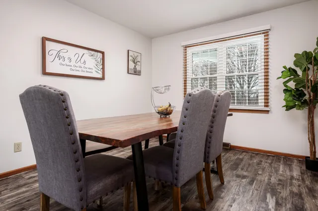 a kitchen with stainless steel appliances granite countertop a sink and cabinets