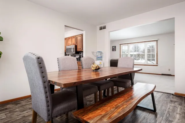 a kitchen with a stove a sink and a refrigerator