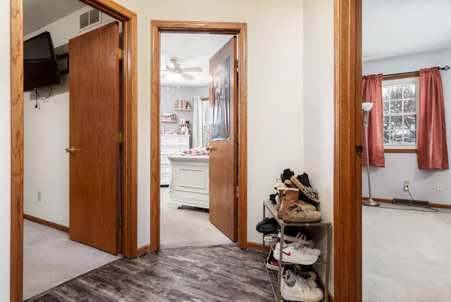 a bathroom with a sink toilet and mirror