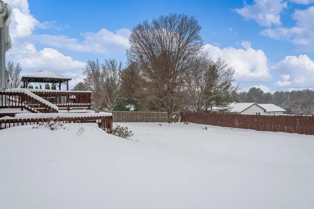 a view of a roof deck with couches