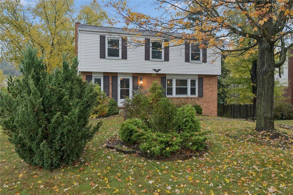 412 Church Road Bethel Park, PA 15102 - Photo 2 of 37 a front view of a house with a yard