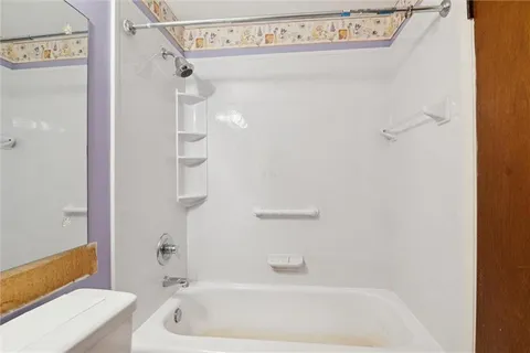 a bathroom with a bathtub