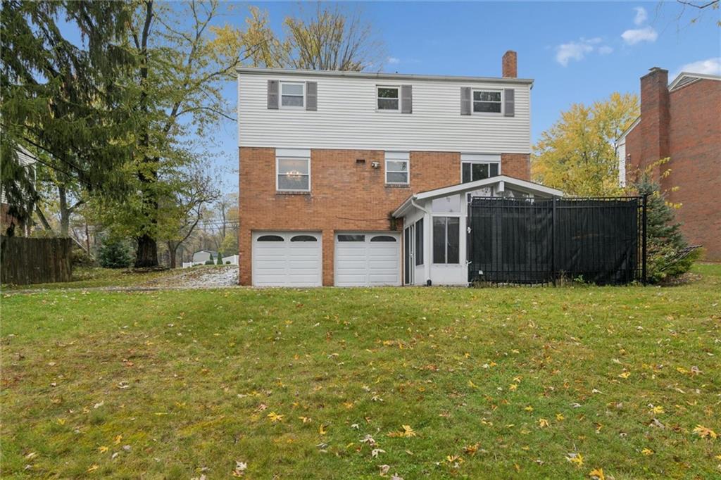 412 Church Road Bethel Park, PA 15102 - Photo 36 of 37 front view of a house with a yard