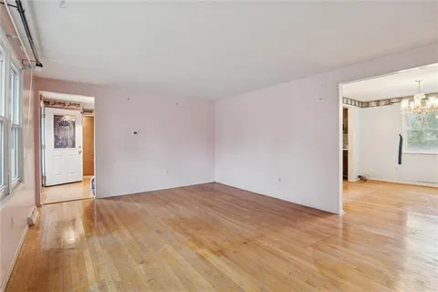 a view of an empty room and window