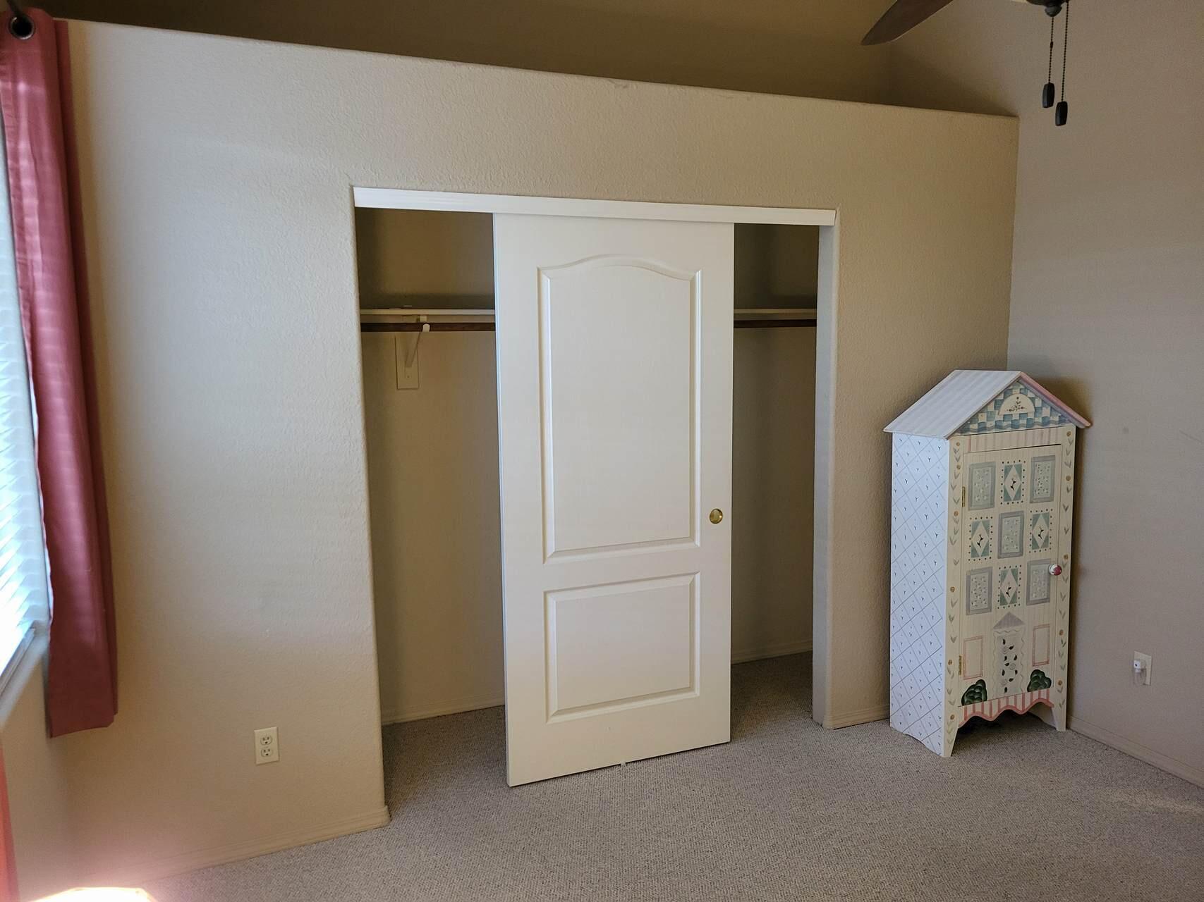 1120 South Sycamore Circle Payson, AZ 85541 - Photo 28 of 44 a view of an empty room with closet and mirror