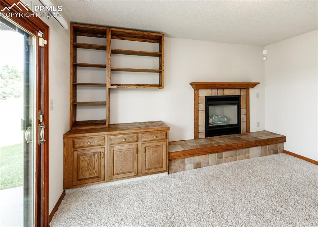 17908 New London Road Monument, CO 80132 - Photo 23 of 41 a kitchen with stainless steel appliances granite countertop a stove and a refrigerator