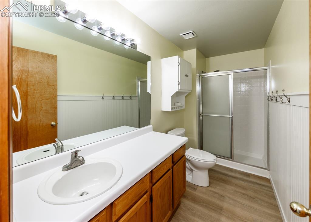 17908 New London Road Monument, CO 80132 - Photo 25 of 41 a bathroom with a sink toilet and shower