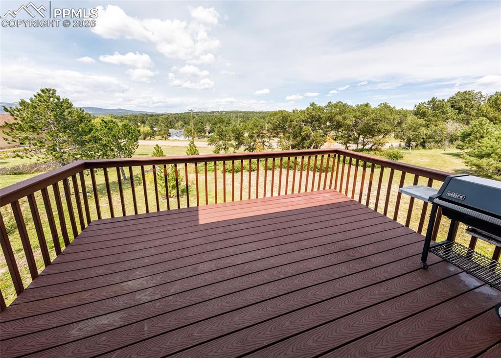 17908 New London Road Monument, CO 80132 - Photo 31 of 41 a view of balcony with wooden floor and fence