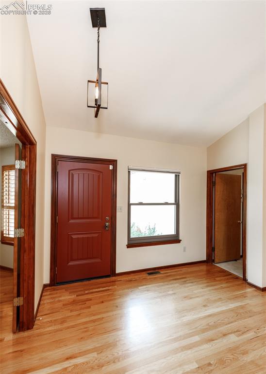 17908 New London Road Monument, CO 80132 - Photo 6 of 41 an empty room with windows and closet