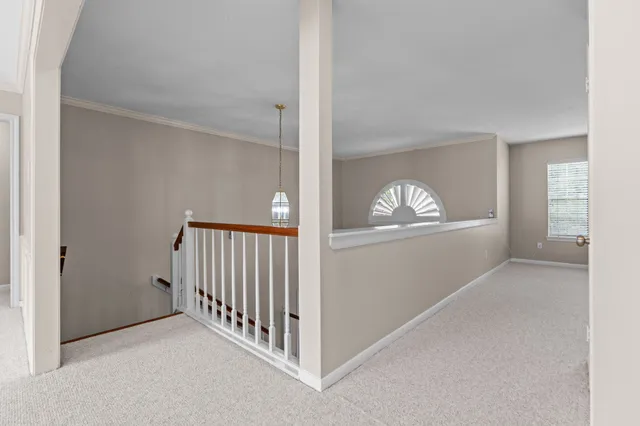 a view of a livingroom with a staircase