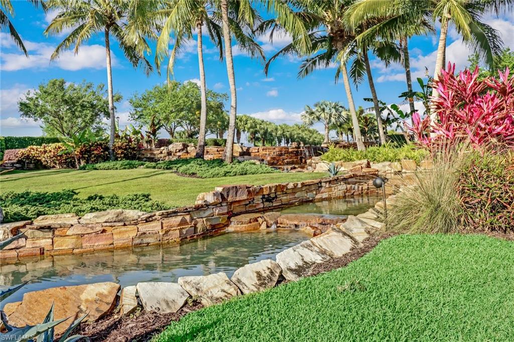 1233 Kendari Terrace Naples, FL 34113 - Photo 25 of 38 a view of a backyard